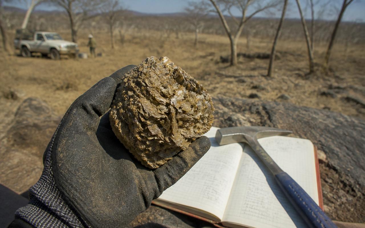 Vermiculite sample being examined at a Ugandan project site